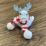 white duck with horns and scarf