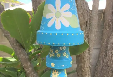 Image of painted clay pot wind chime that links to event page