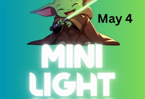 Green background with small green alien with glowing light saber. Text Mini Light Sabers May 4.