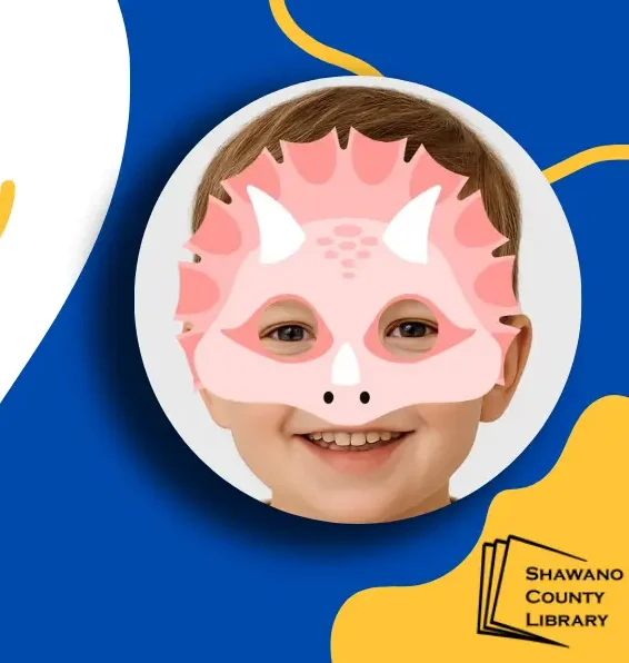 Blue and yellow background with Shawano County Library logo in lower corner. Photo of boy with pink dinosaur mask on his face.