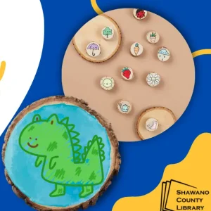 Blue background. Green dinosaur with a blue background on a wood magnet. Shawano County logo.