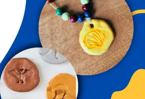 Blue background. Fossil and footprints in clay. Beaded neckless with yellow clay pendent.
