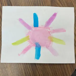 A colorful child-like drawing of a sun with pink, blue, & yellow rays, links to more information