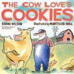 A book cover of "The Cow Loves Cookies," by Karma Wilson, featuring a cow & a farmer, links to more information