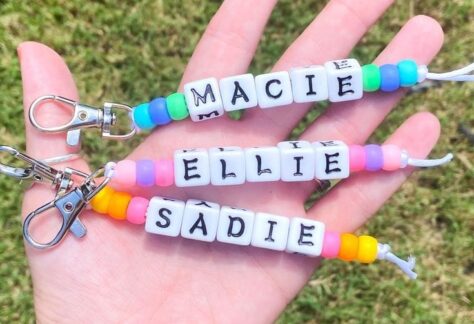 Image of 3 beaded keychains with name beads.