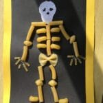 Image of a skeleton picture made from different pasta shapes