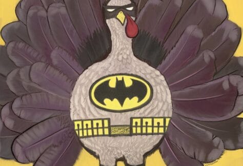 Image of a turkey decorated to look like batman.