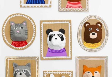 Photo of several animal portraits made from egg carton cups and paint