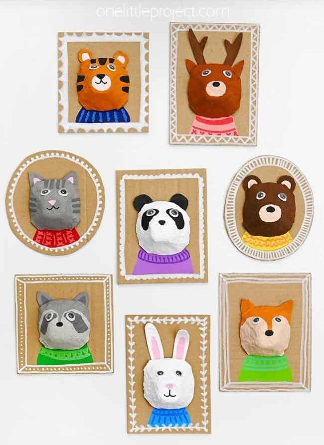 Photo of several animal portraits made from egg carton cups and paint